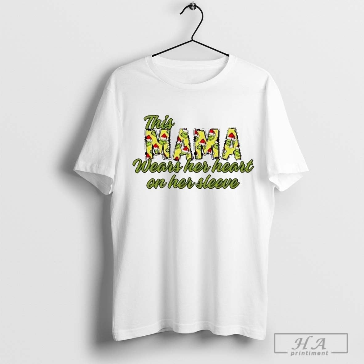 This mama wears her heart on her sleeve Grinch Christmas shirt