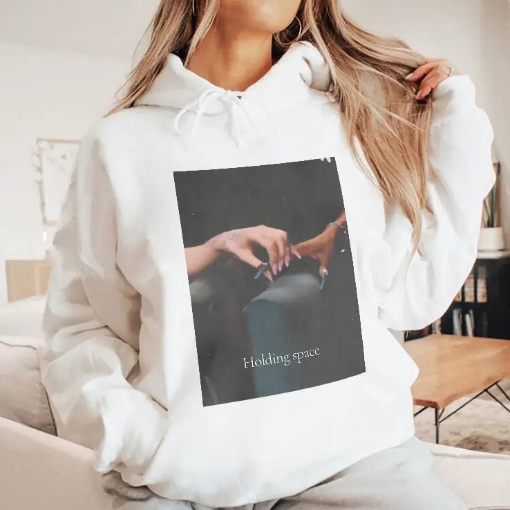 Ariana Holding Cynthia Finger Holding Space Wicked T Shirt