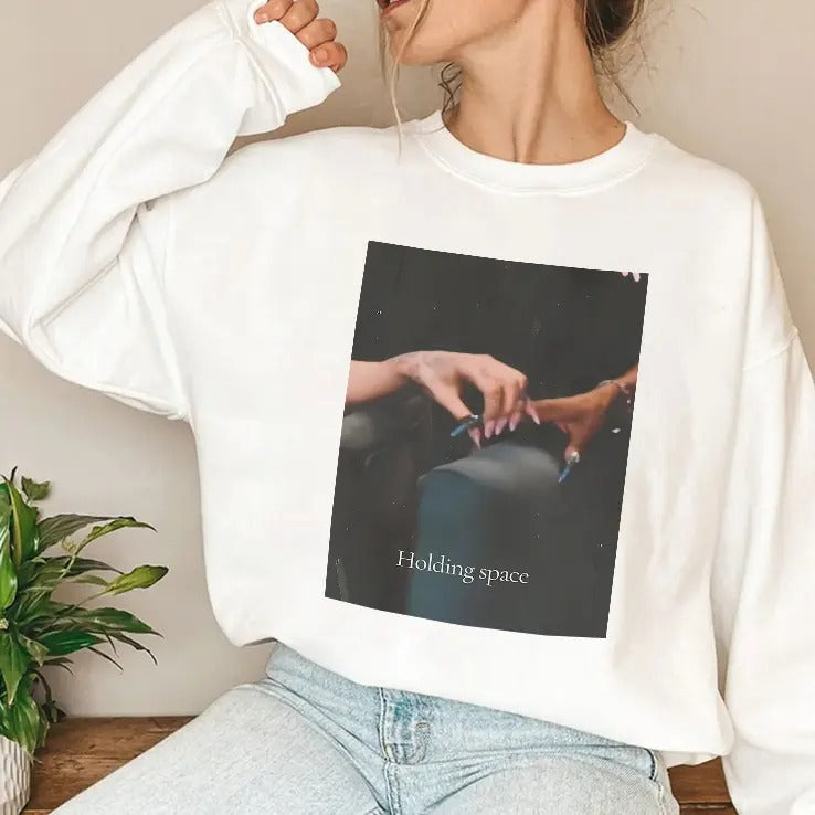 Ariana Holding Cynthia Finger Holding Space Wicked T Shirt