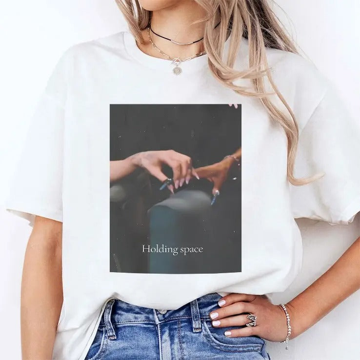 Ariana Holding Cynthia Finger Holding Space Wicked T Shirt