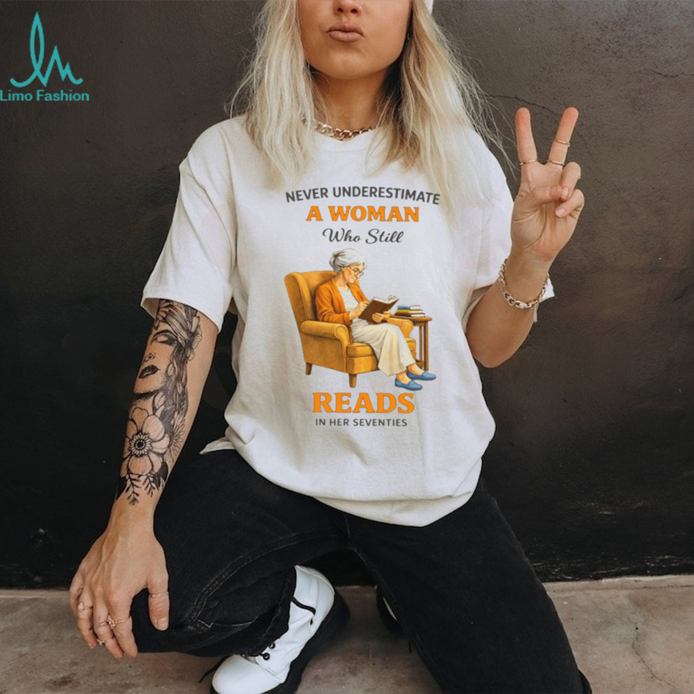 Never Underestimate A Woman Who Still Reads In Her Seventies Graphic T shirt