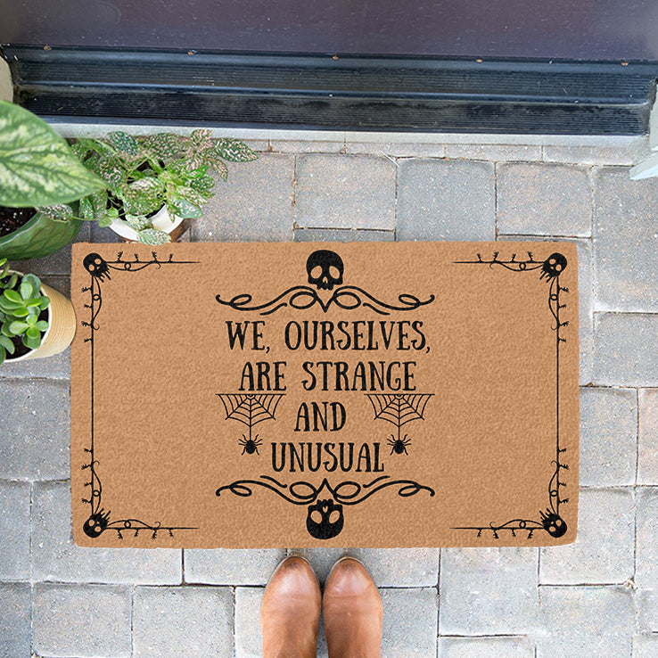 We Ourselves Are Strangle And Unusual Halloween Doormat