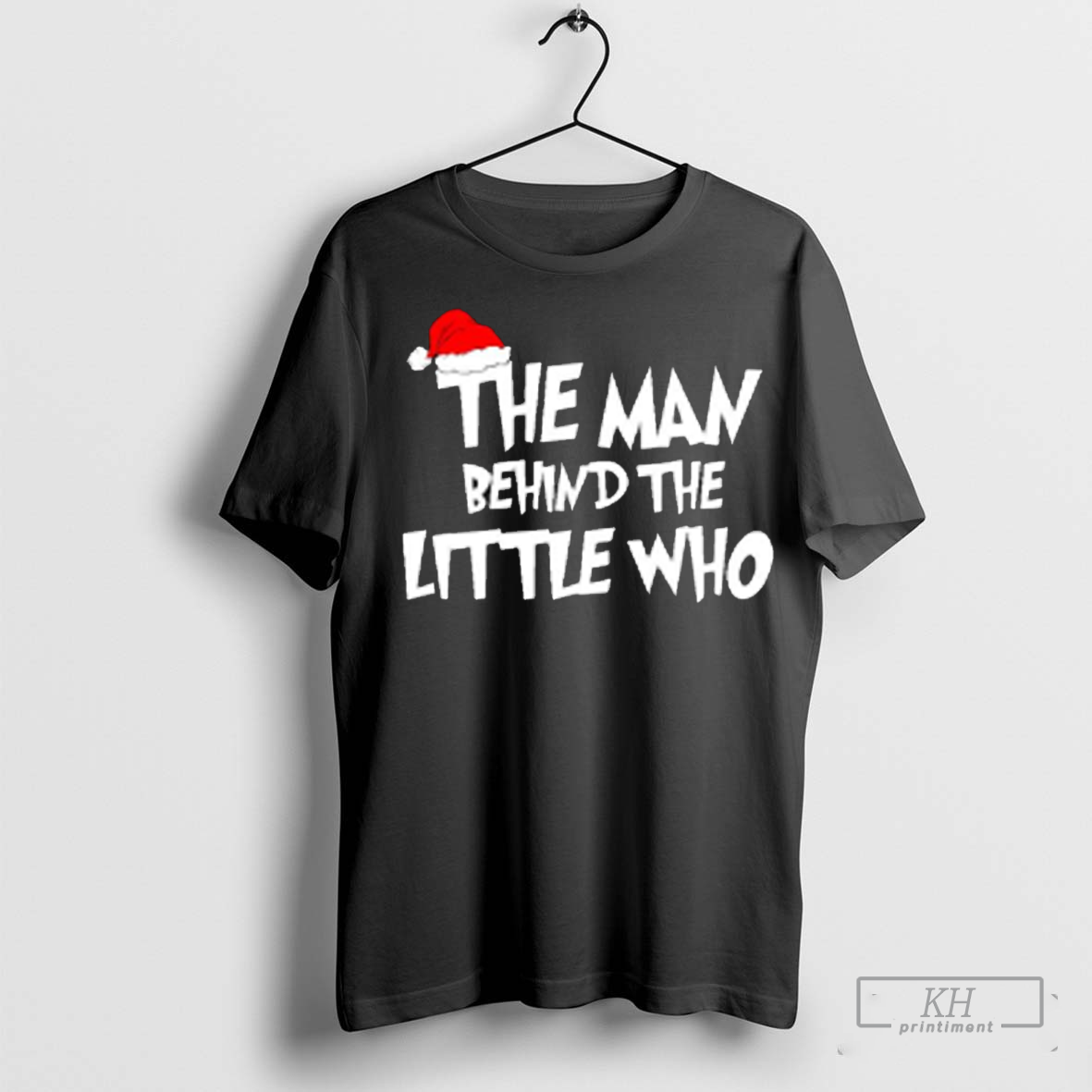 The man behind the little who shirt